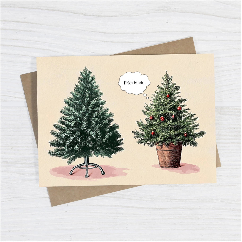 Fake Bitch Christmas Card on table.