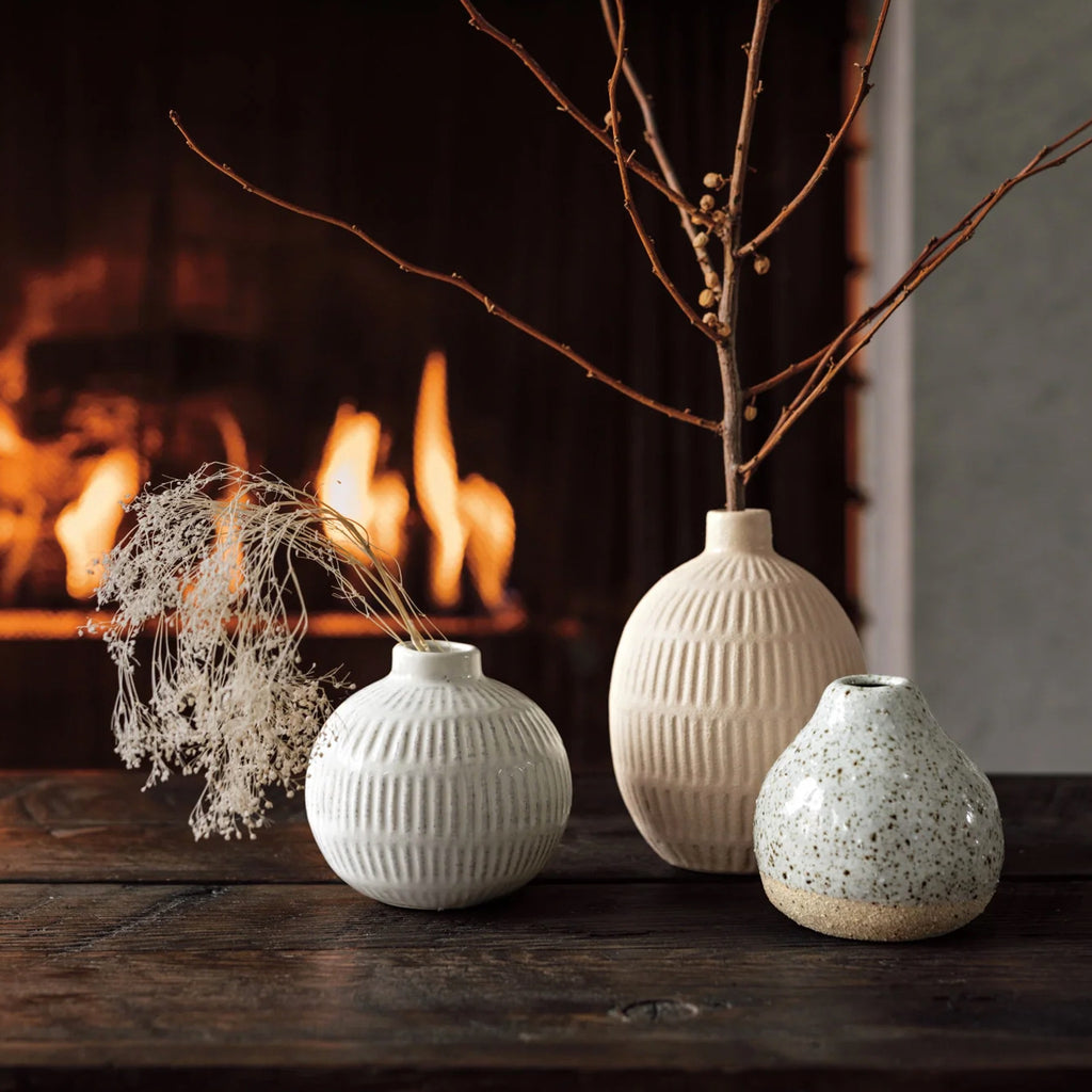 Fleck Ceramic Bud Vase on table.