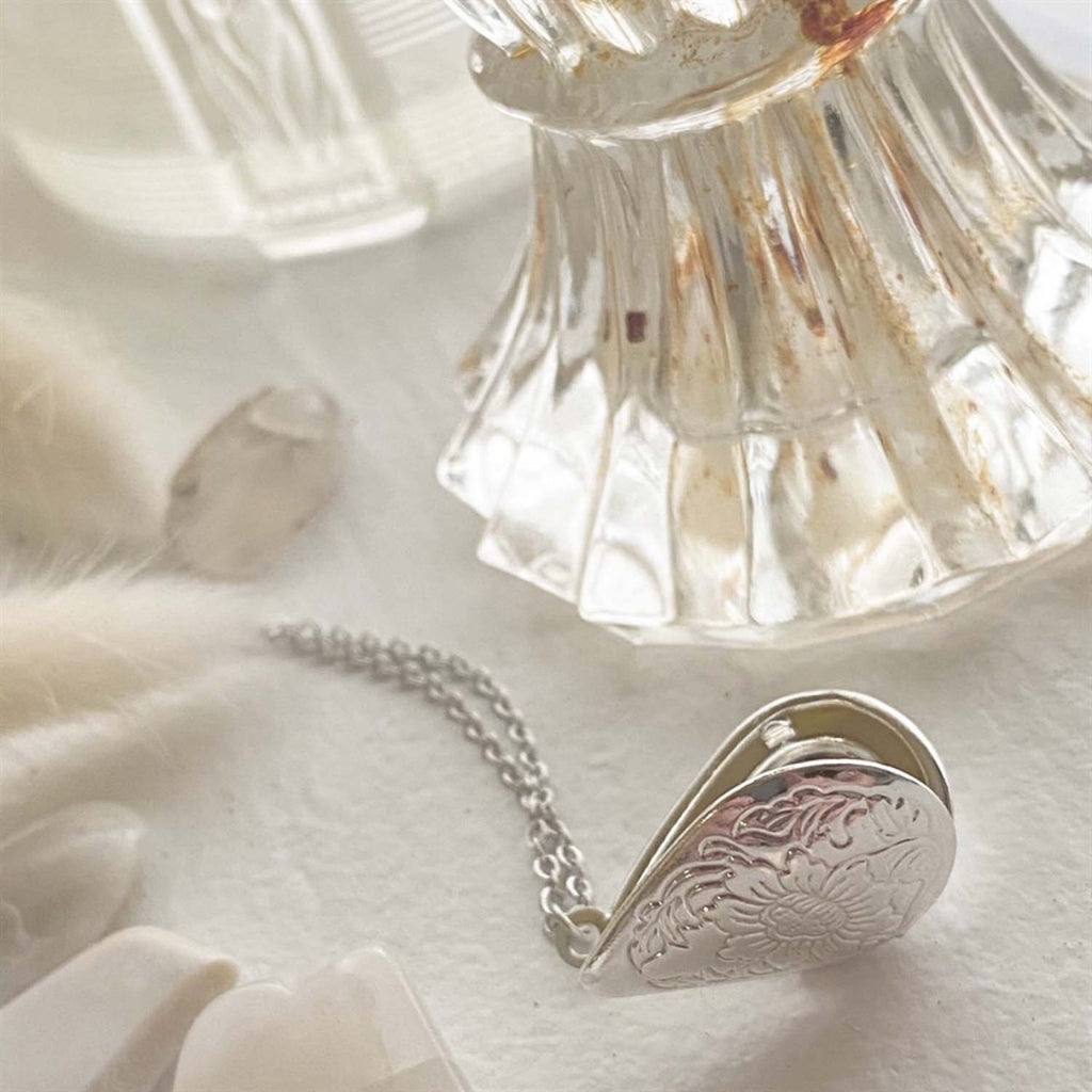 Floral Design Teardrop Locket Necklace Silver open.