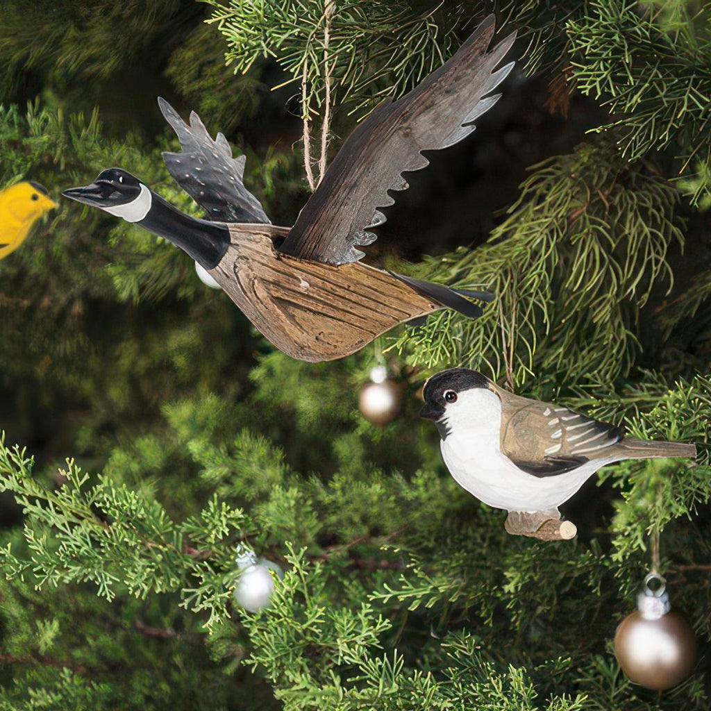 Flying Canada Goose Ornament in tree.