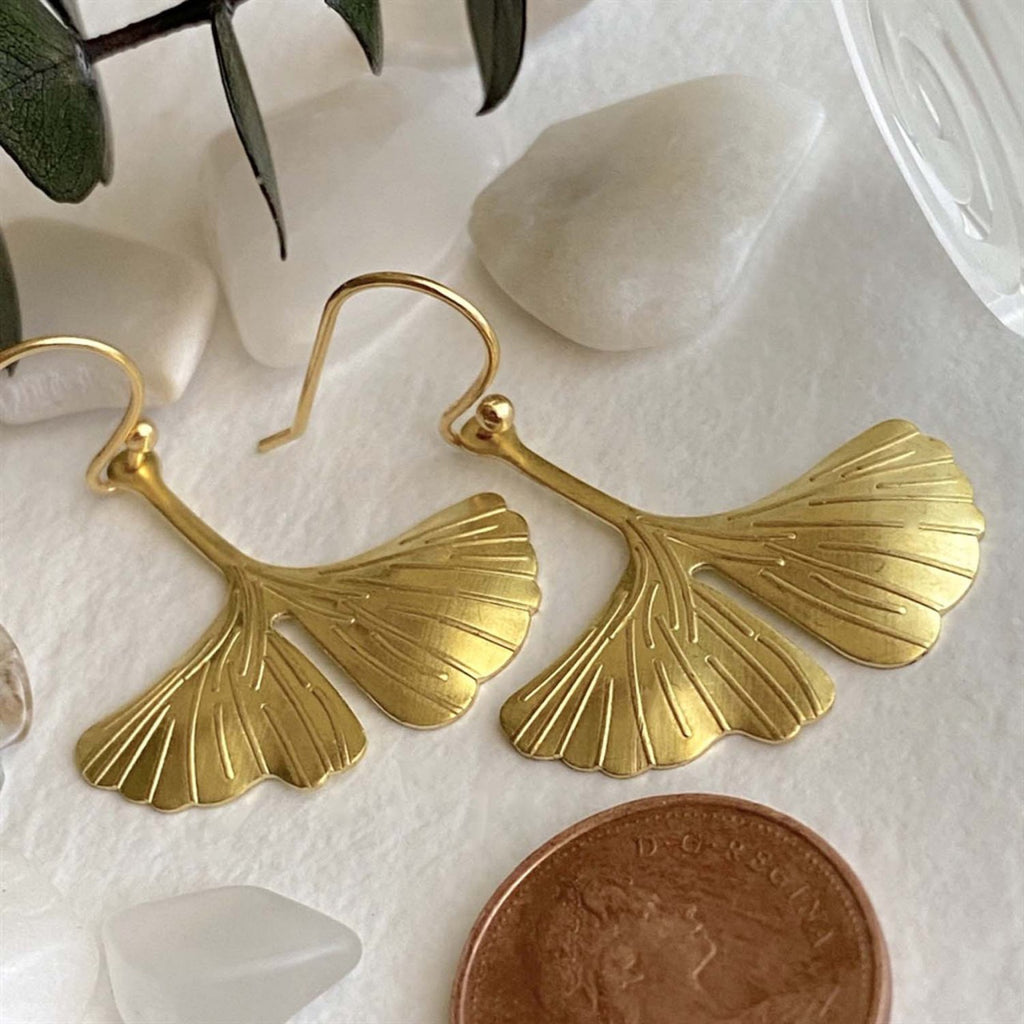 Ginkgo Leaf Drop Earrings Brass with penny.