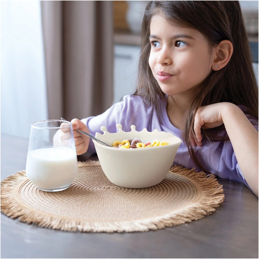 Girl using Spilt Milk Cereal Bowl.