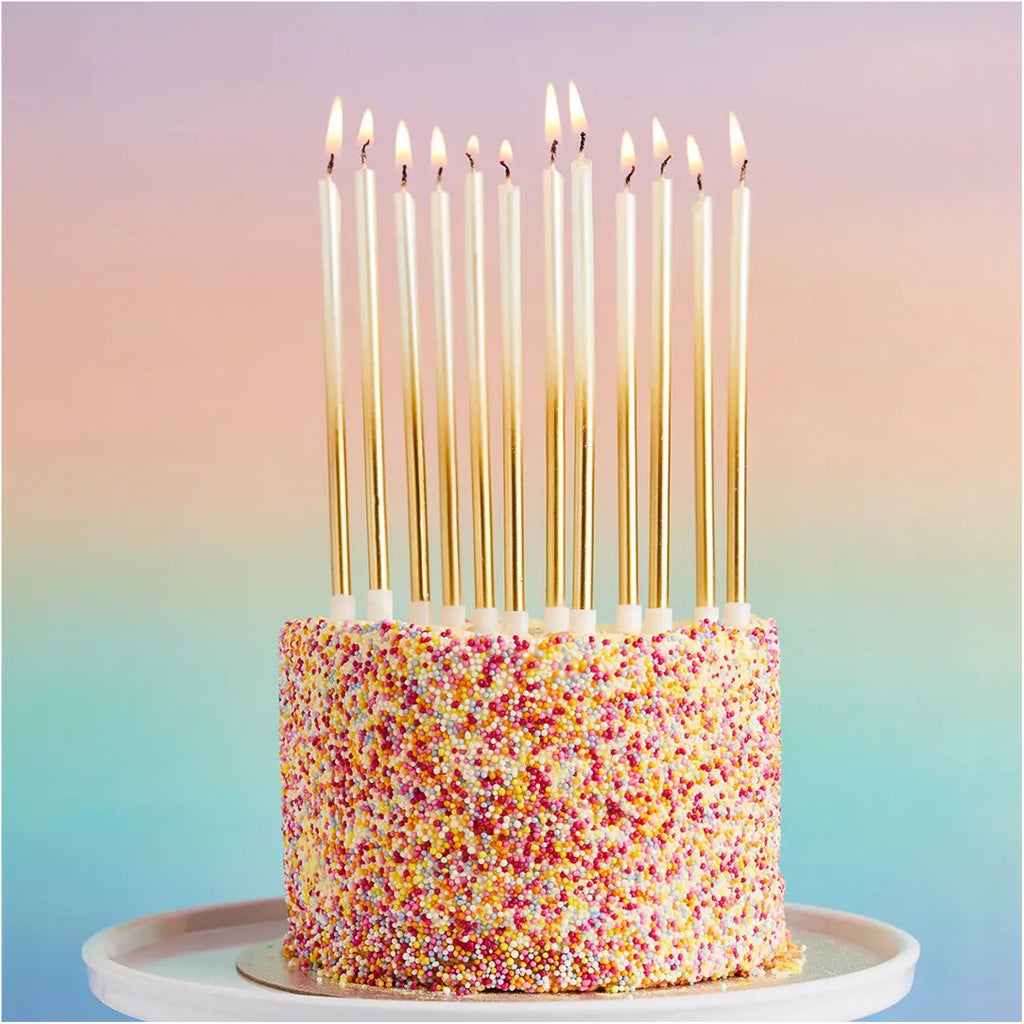Gold Ombre Tall Skinny Birthday Candles on cake.