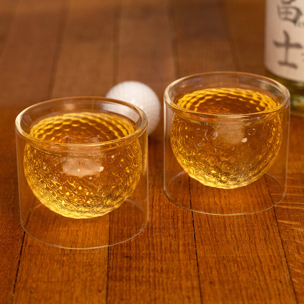 Golf Ball Glasses on table.