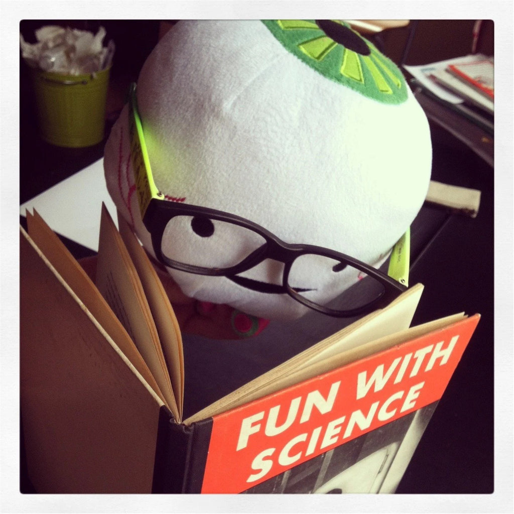 Green Iris Eyeball Plush reading.