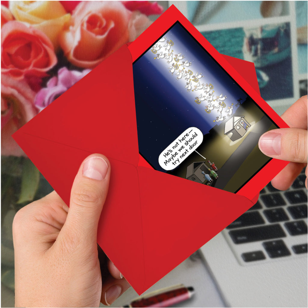 Guiding Light Christmas Card in hand.