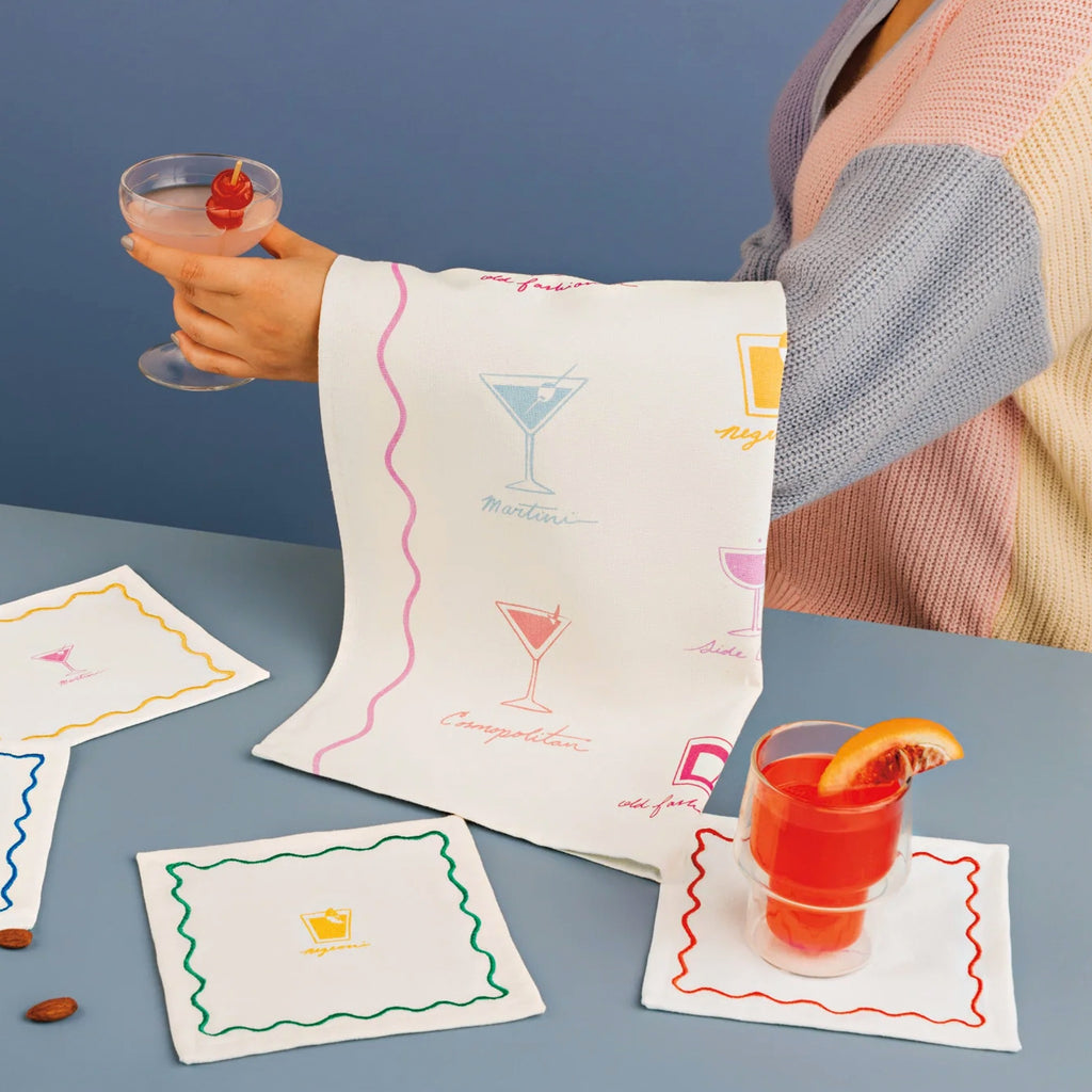 Happy Hour Printed Dishtowel on table.