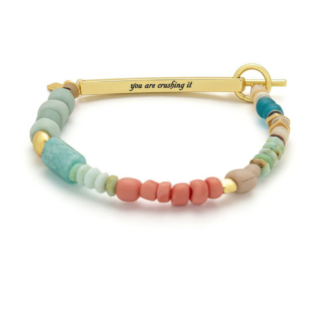 Hidden Message Bracelet Crushing It with metal tag.