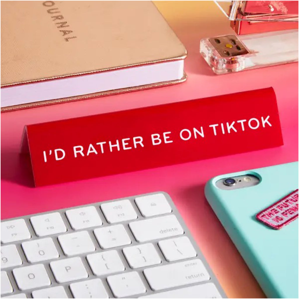 I'd Rather Be On TikTok Desk Sign on table.