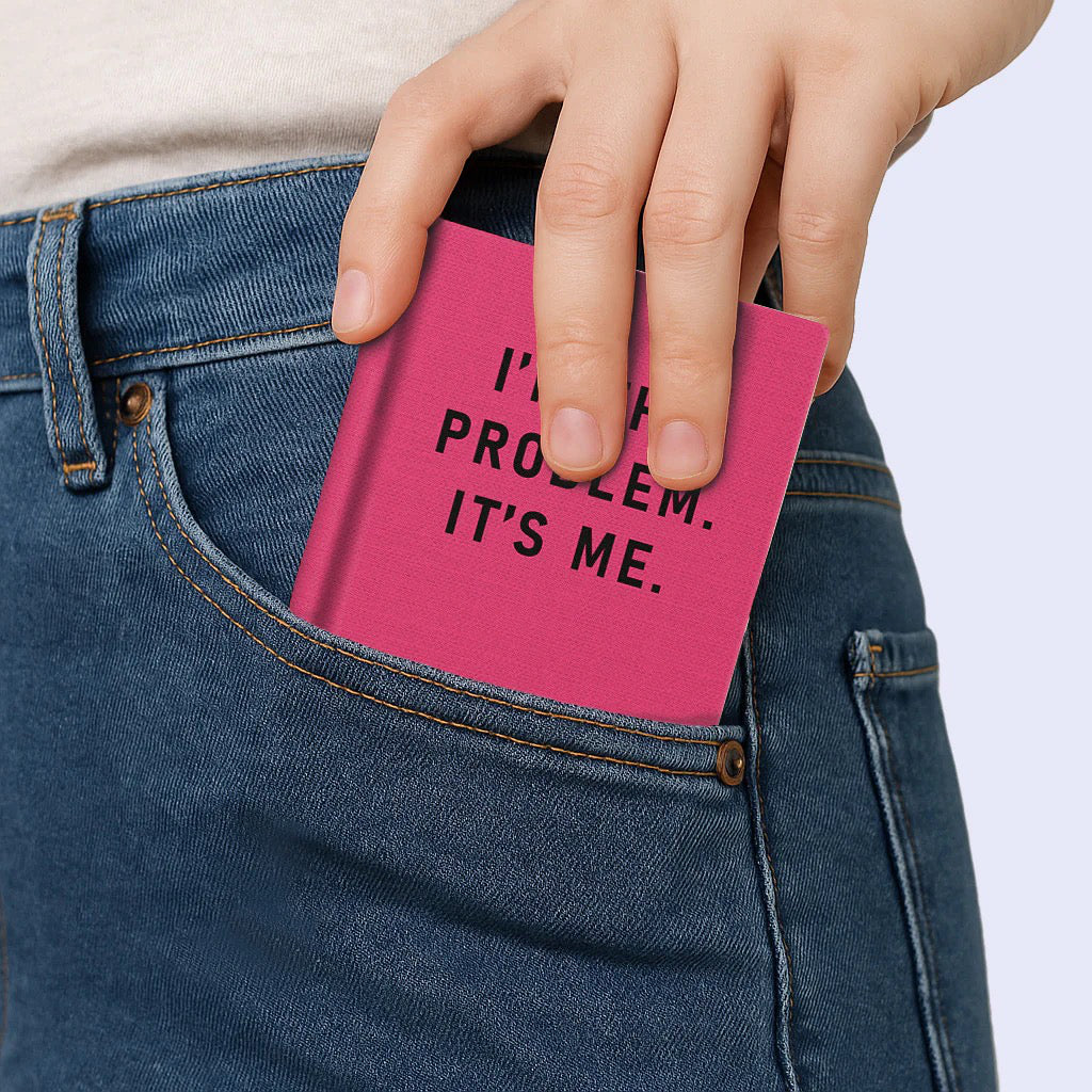I'm The Problem; It's Me Mini Hardback Notebook in hand.