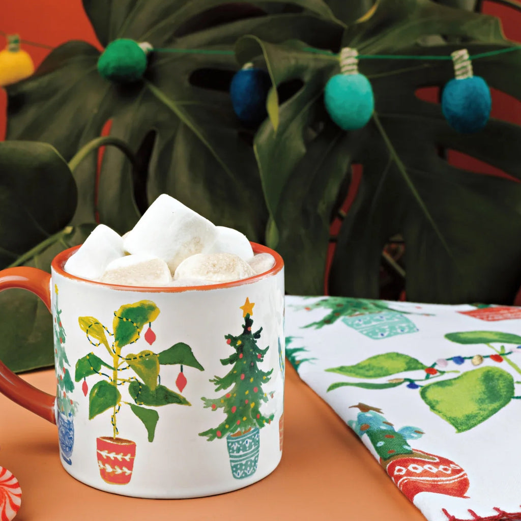 Jingle Plants Christmas Mug in a Box on table.