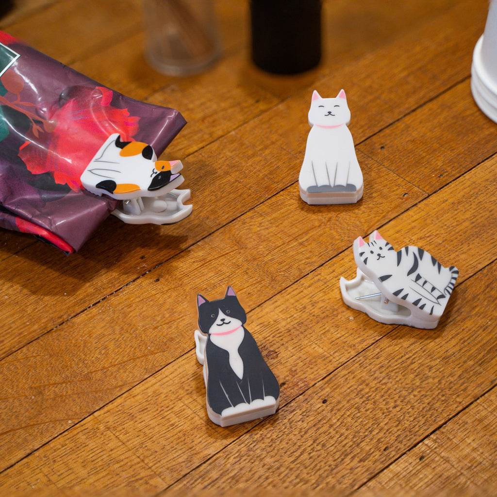 Kittty Bag Clips on floor.