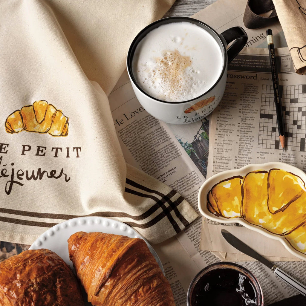 Le Petit Dejeuner Latte Mug on table.
