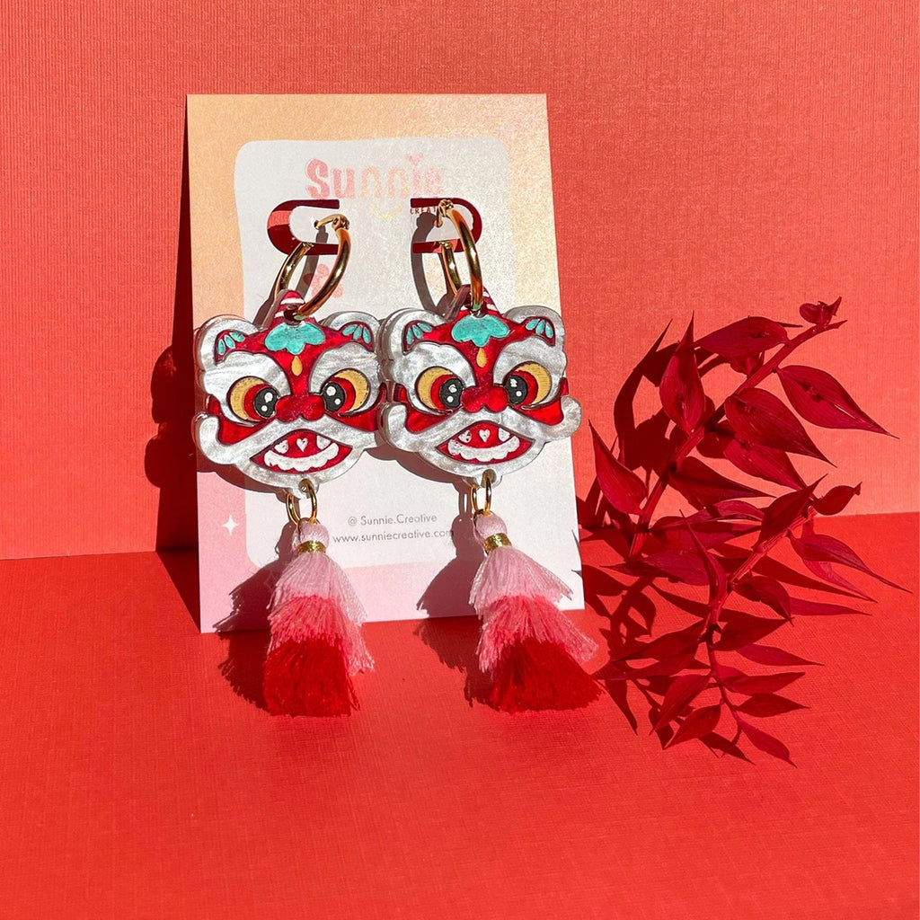 Lion Dance Earrings packaging.