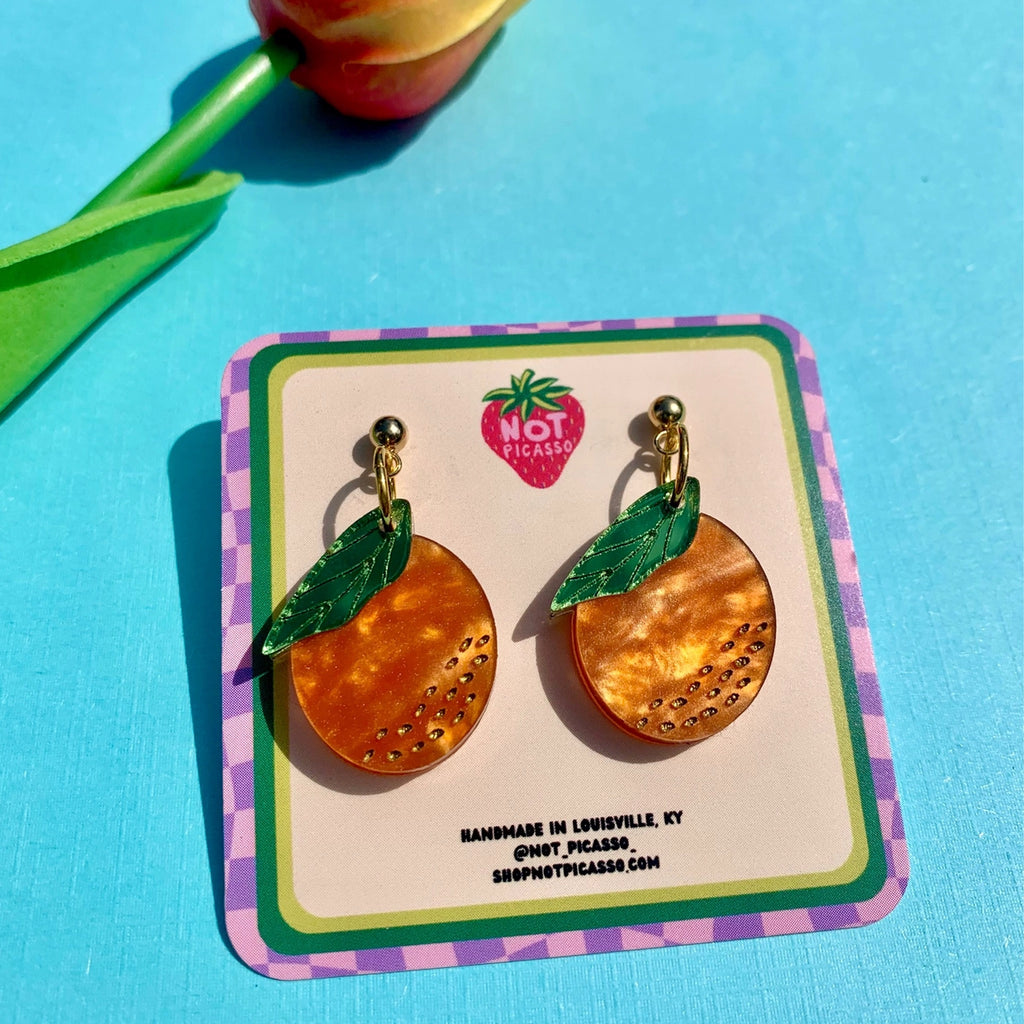 Mini Orange Earrings packaging.