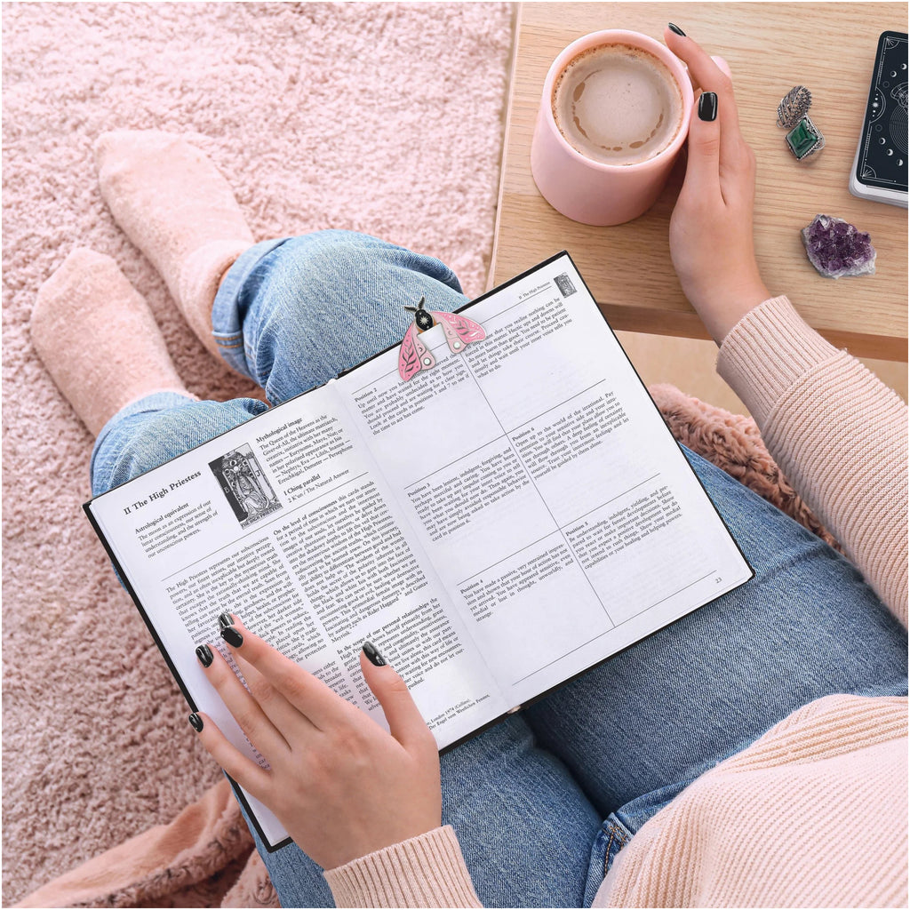 Moth Marks Bookmarks on book.