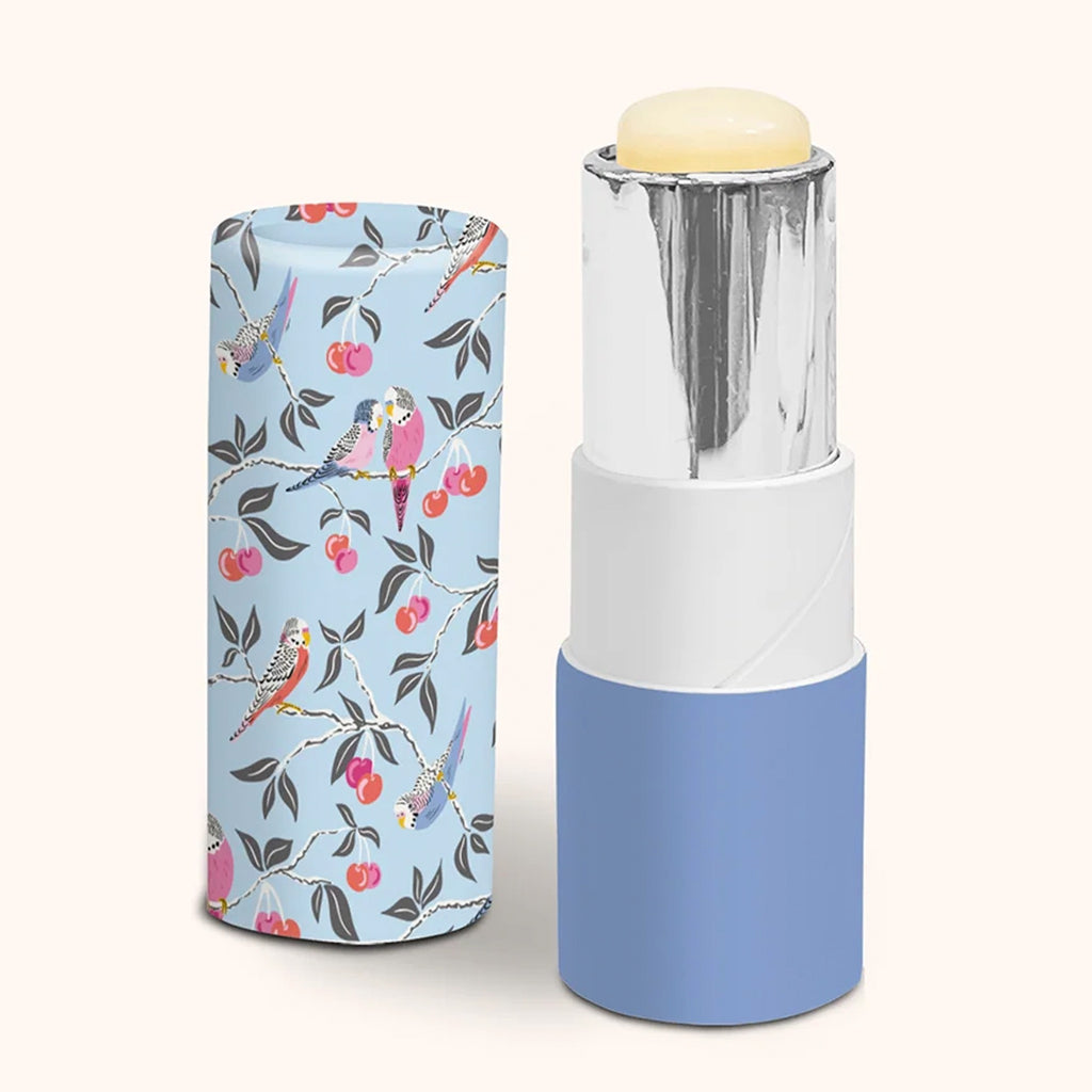 Open view of Birds In The Cherry Tree Lip Balm & Hand Lotion Set.