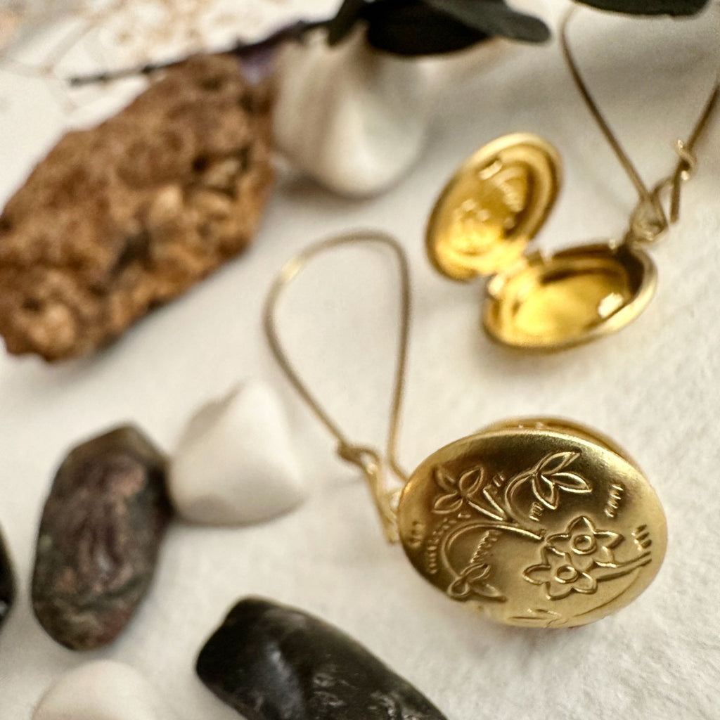 Open view of Locket Drop Earrings Brass.