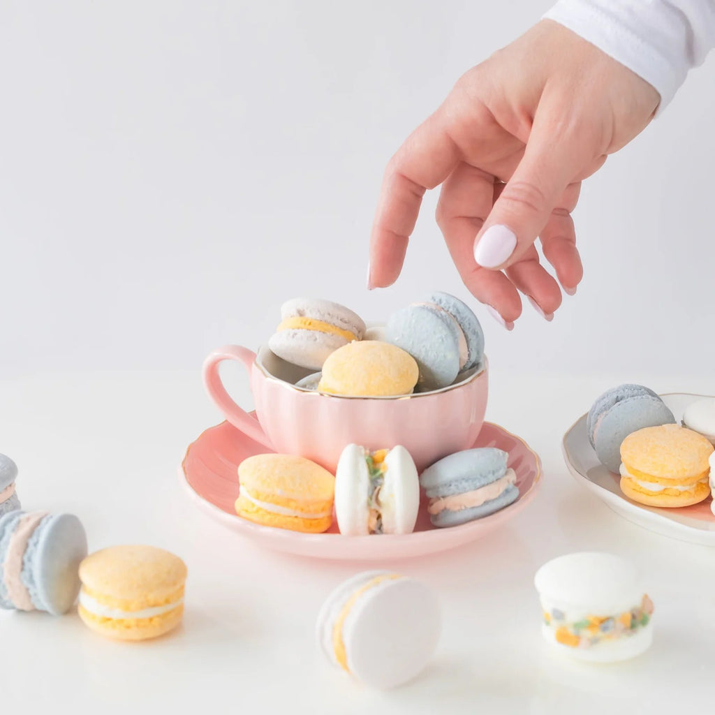 Orange Cream Bath Macarons on table.