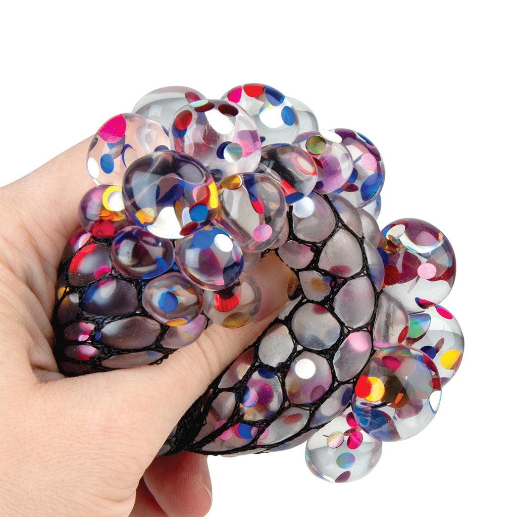 ORB Curiosities Confetti Ball in hand.