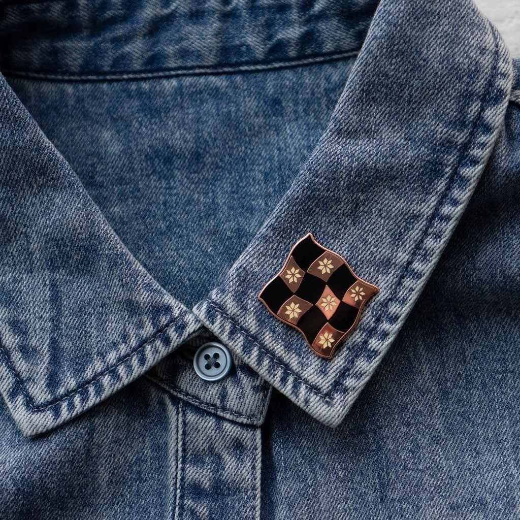 Patchwork Pin on jacket.