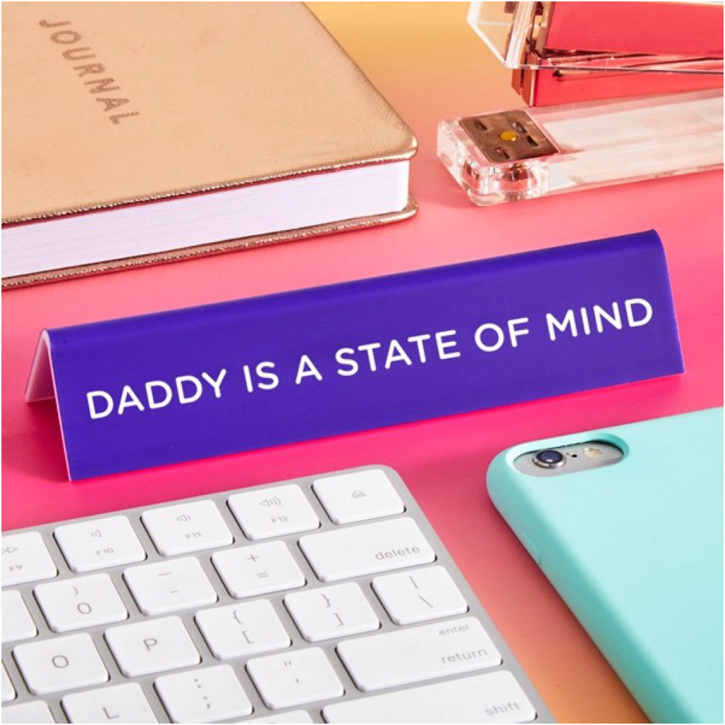 Pedro Daddy Is A State of Mind Desk Sign on table.