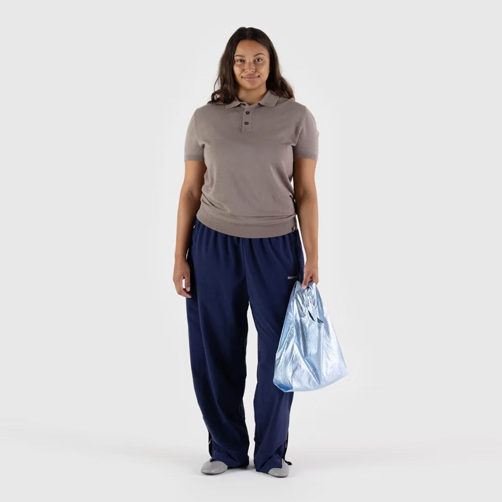 Person holding Baby Baggu Metallic Light Blue.