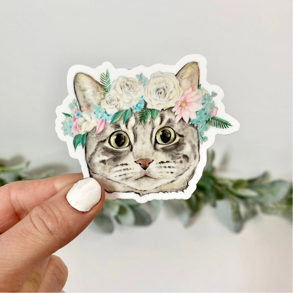 Person holding Cat With Flower Crown Sticker.