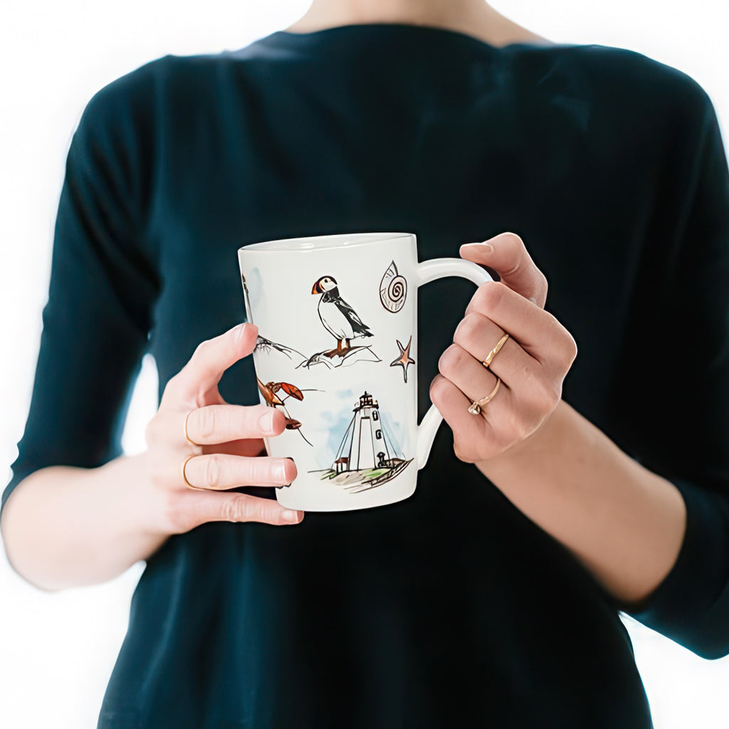 Person holding Coastal Icons Tall Mug.