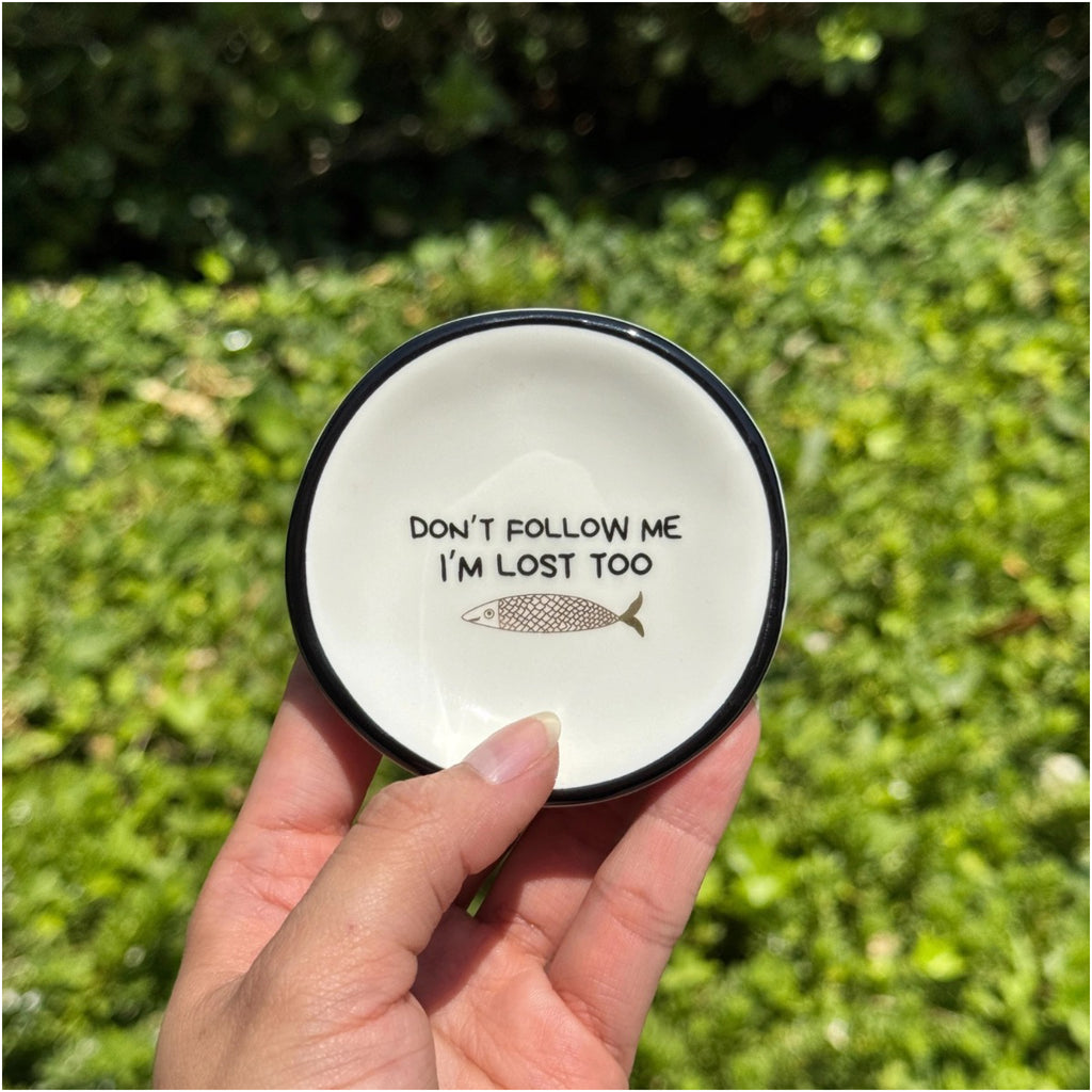 Person holding Don't Follow Me, I'm Lost Too Ring Dish.