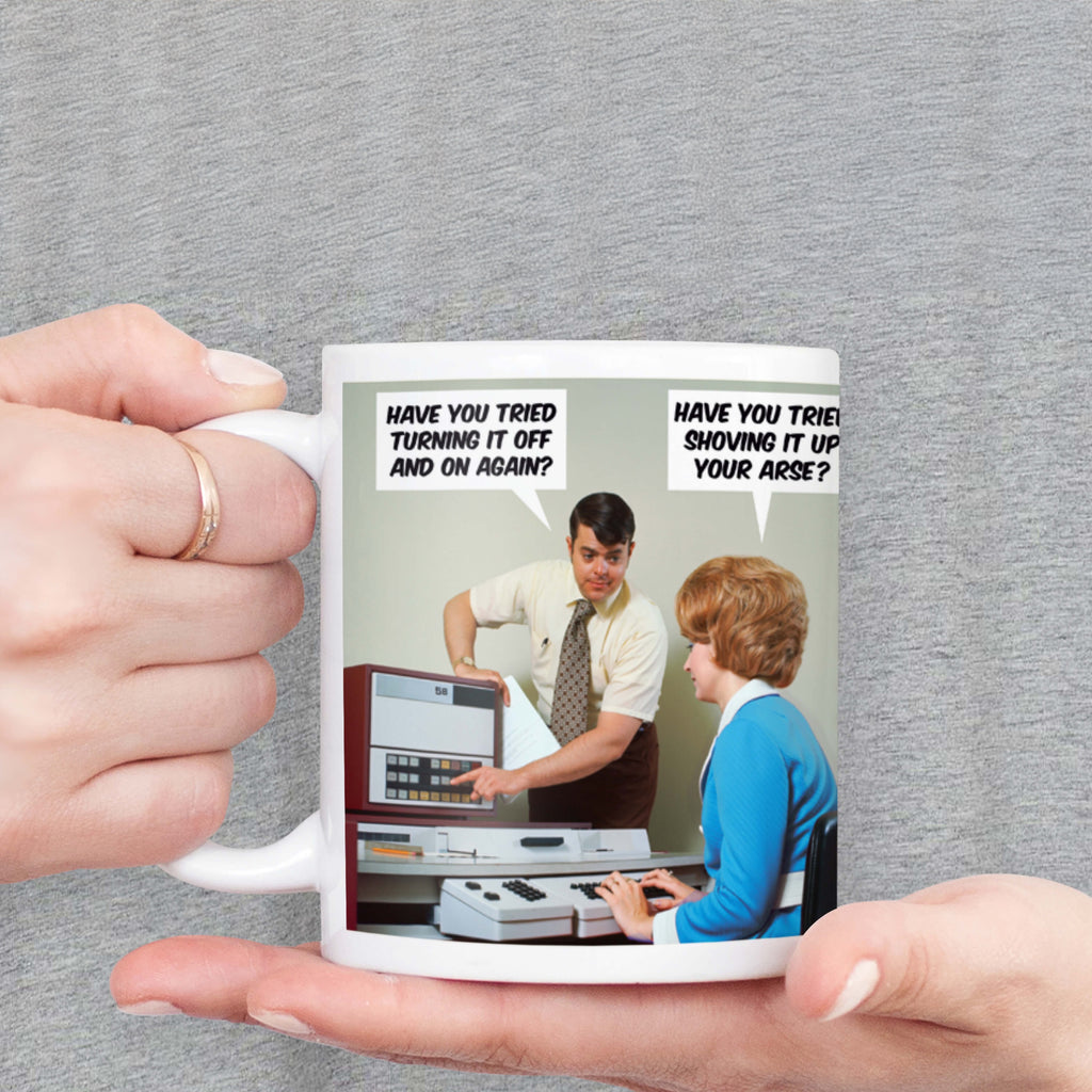 Person holding Have You Tried Turning It Off Mug.