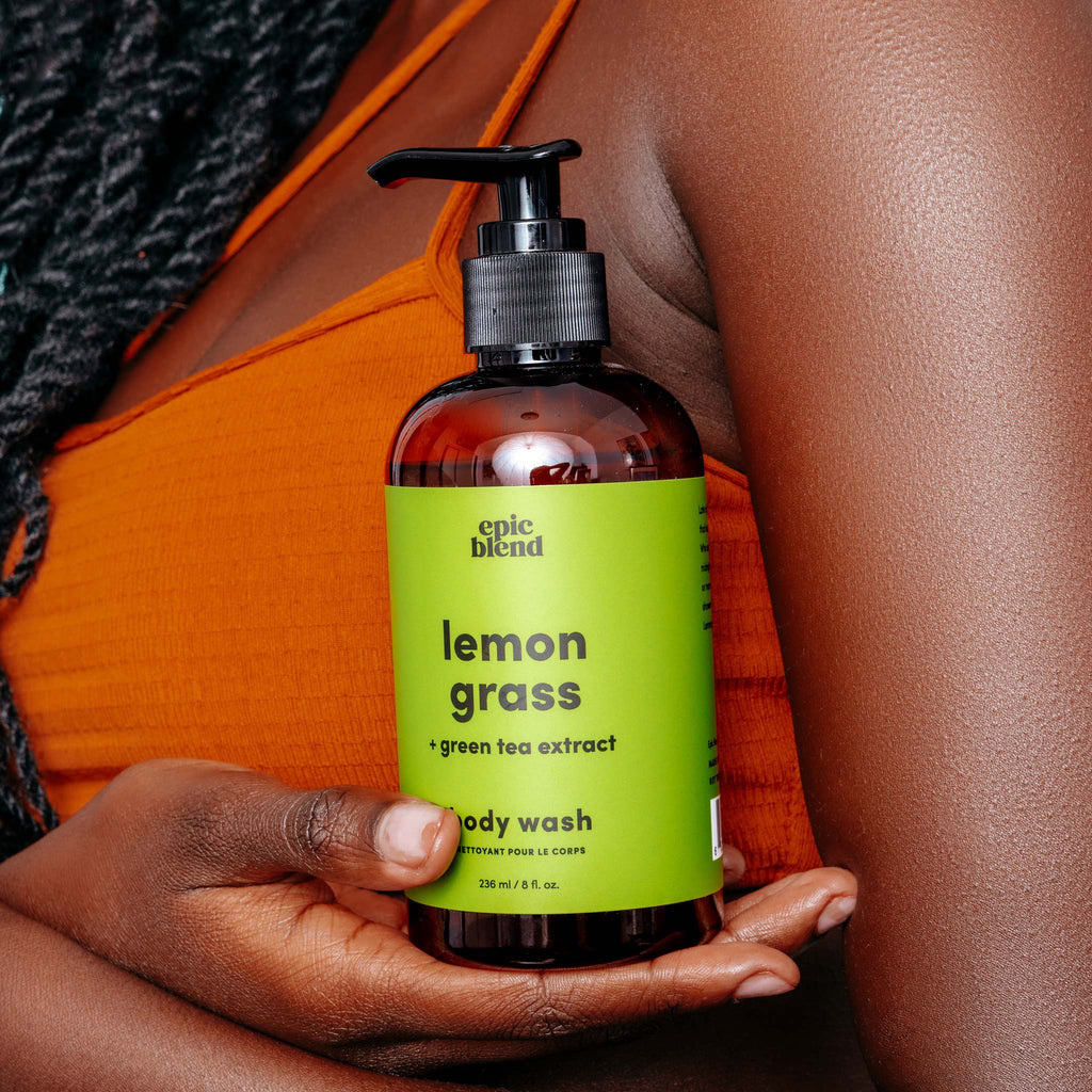 Person holding Lemongrass Body Wash 236mL.