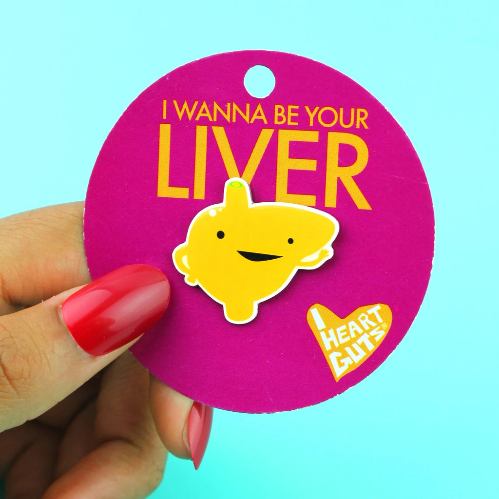 Person holding Liver Lapel Pin.