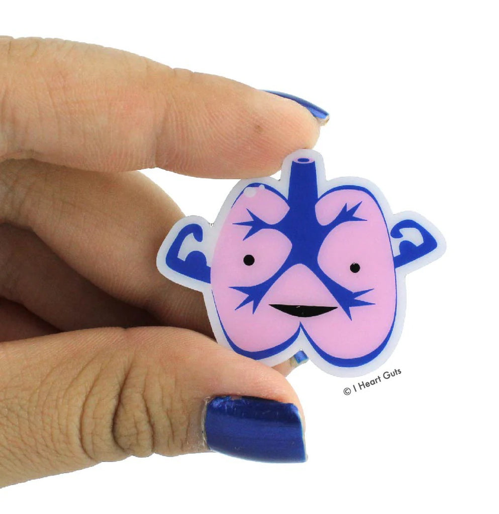 Person holding Lung Lapel Pin.