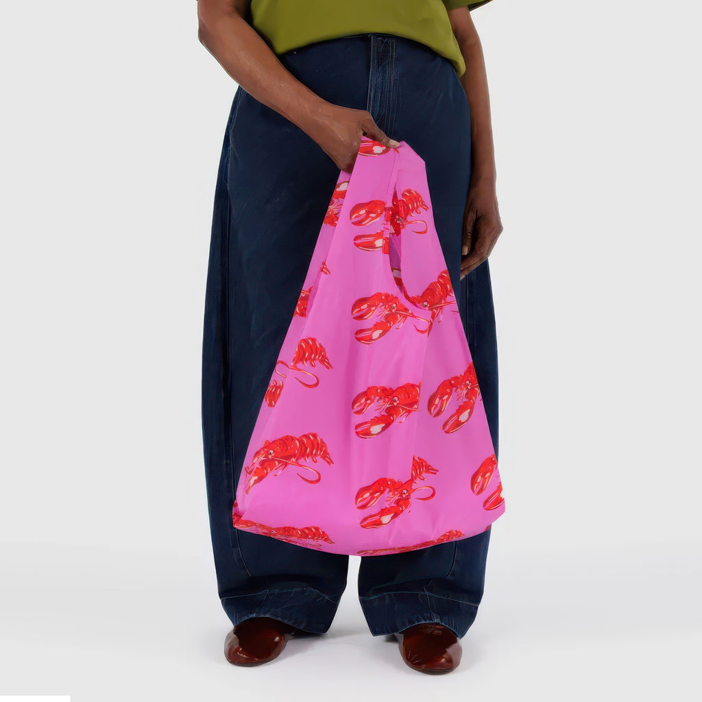 Person holding Standard Baggu Pink Lobster.