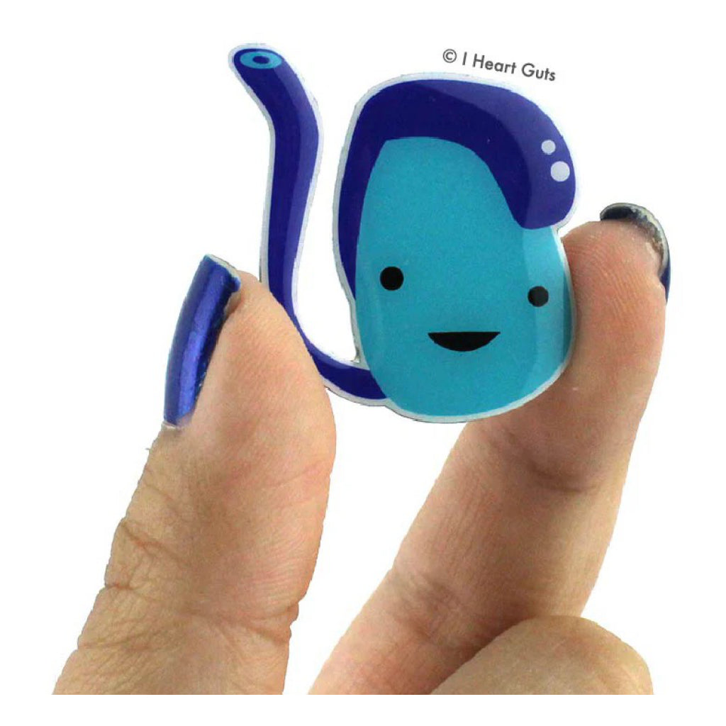 Person holding Testicle Lapel Pin.