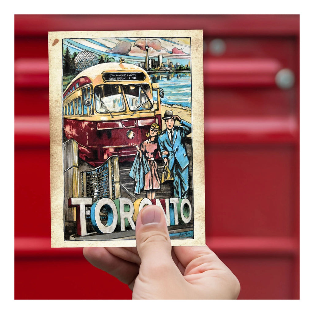 Person holding Toronto, A World Class City Postcard.