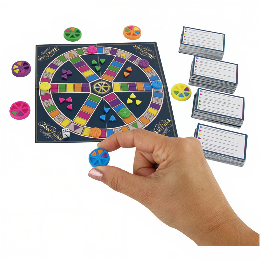 Person holding World's Smallest Trivial Pursuit.