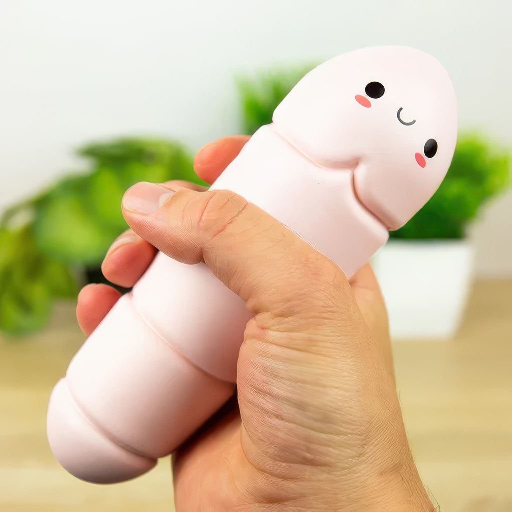 Person holding Worry Worm Stress Reliever.