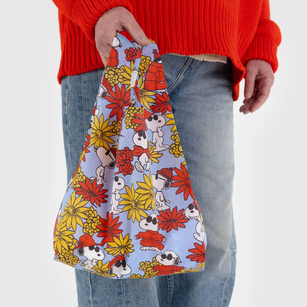 Person using Baby Baggu Floral Snoopy.