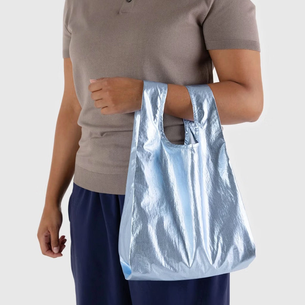 Person using Baby Baggu Metallic Light Blue.