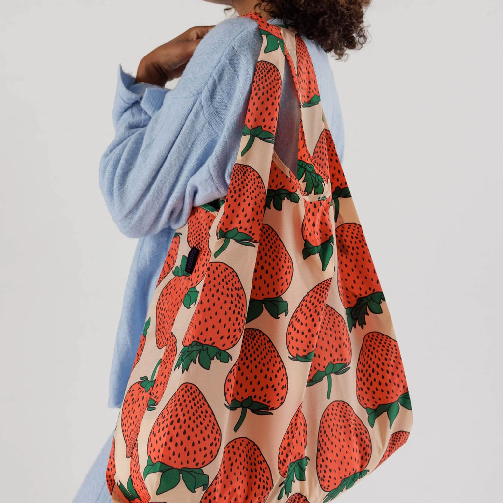 Person using Big Baggu Strawberry.