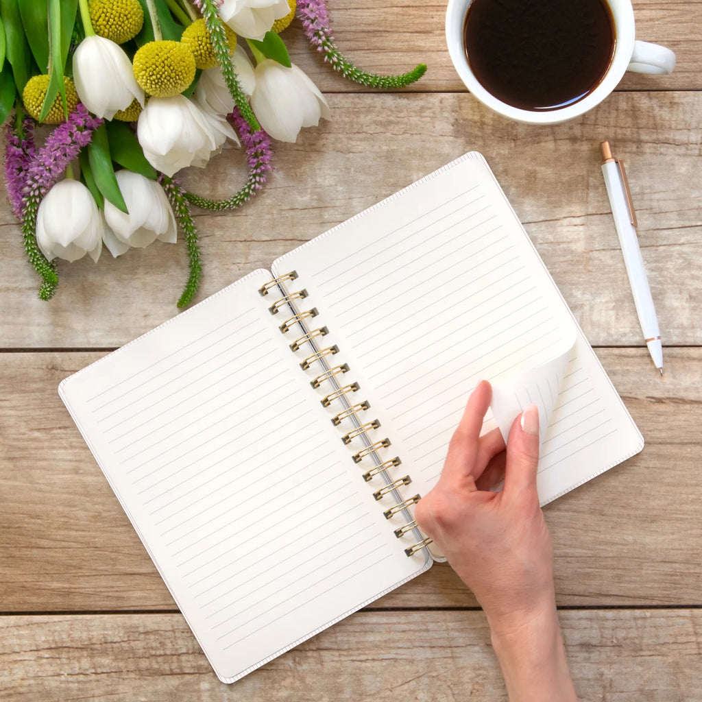 Person using Current Mood Coral Pink Agatha Notebook.