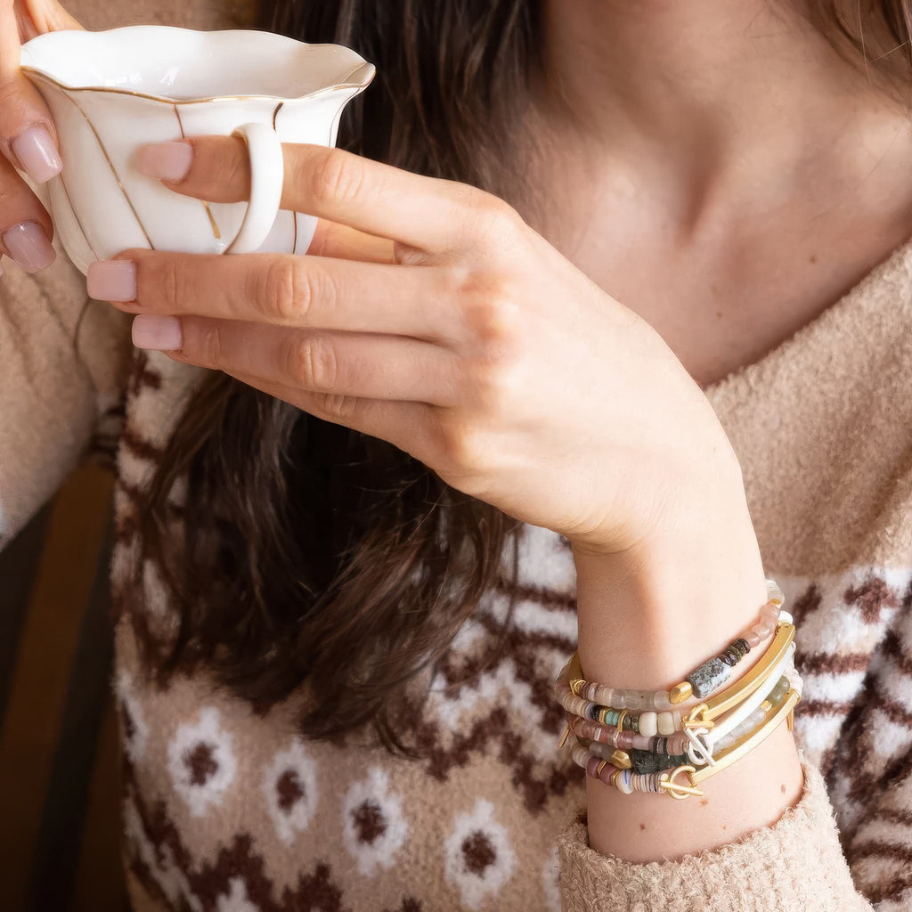 Person using Hidden Message Bracelet Badass.
