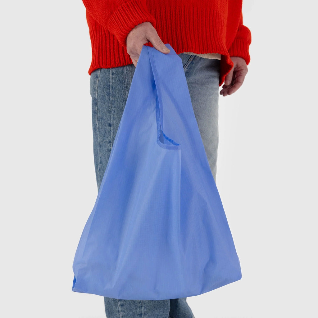 Person using Standard Baggu Cornflower Blue.