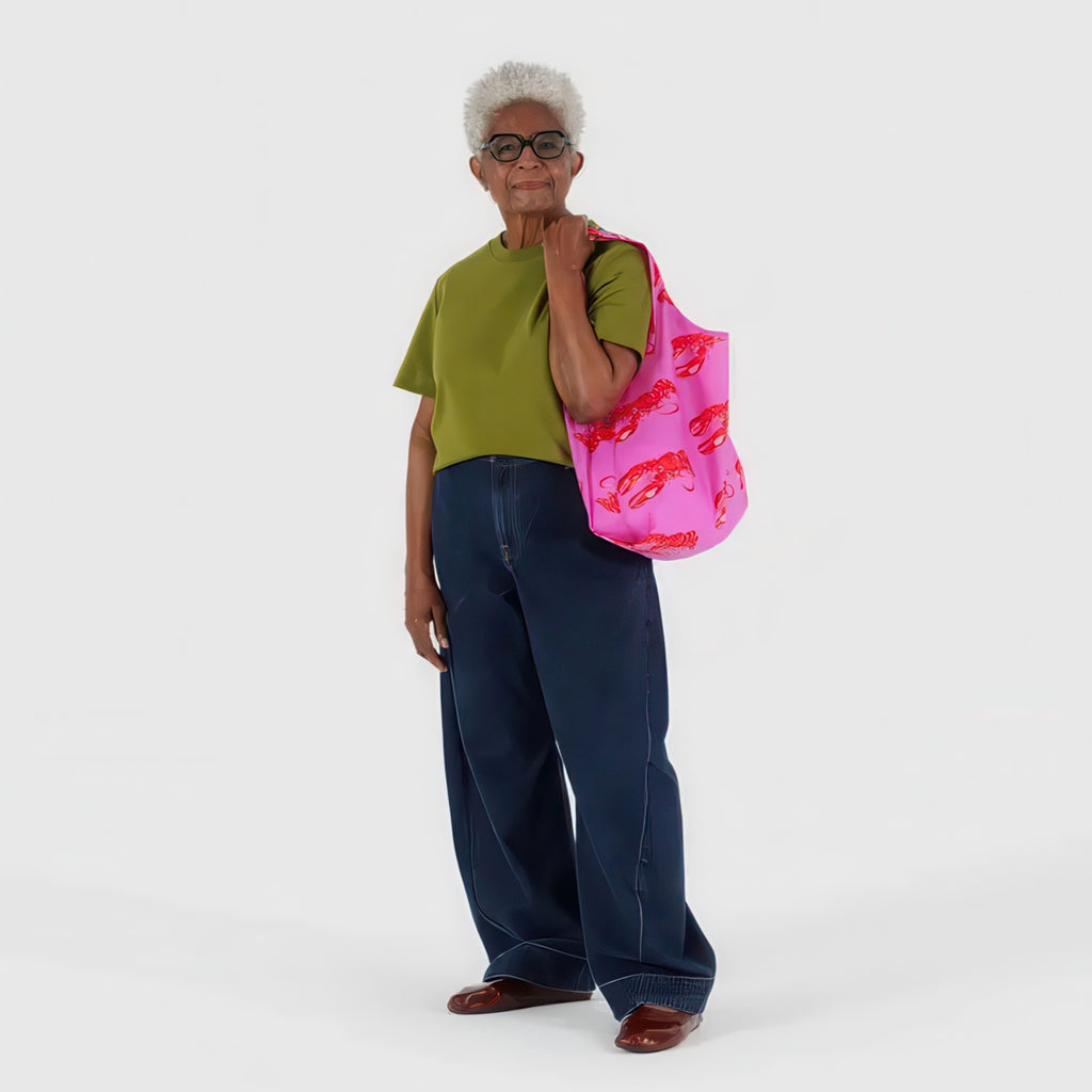 Person using Standard Baggu Pink Lobster.