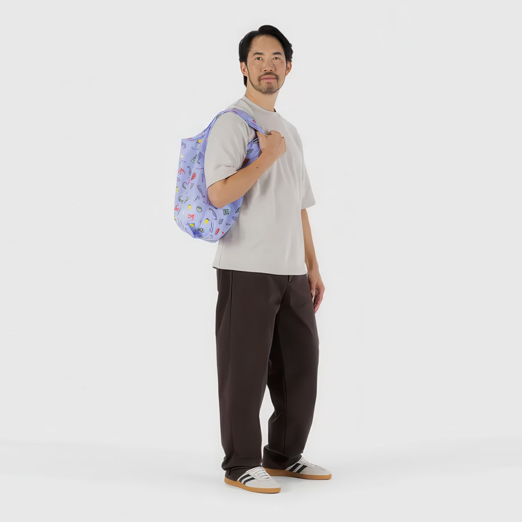 Person using Standard Baggu Sea Charms.