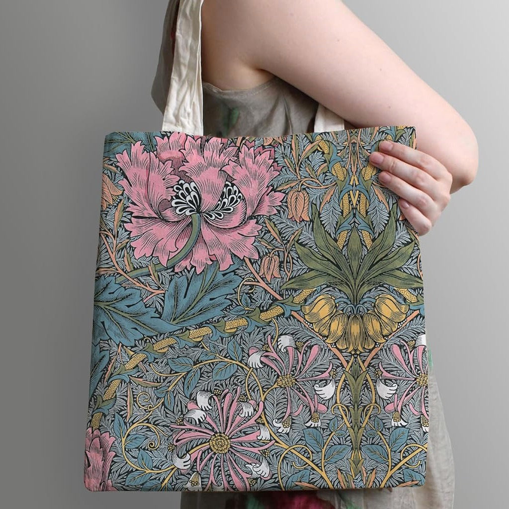 Person using William Morris Pink Honeysuckle Canvas Bag.