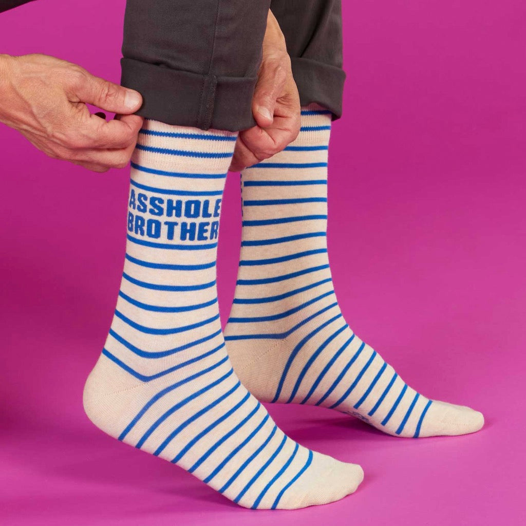 Person wearing Asshole Brother Men's Socks.