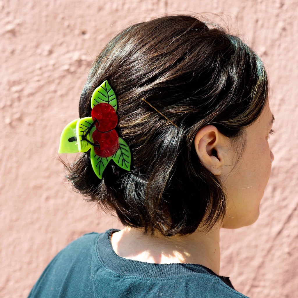 Person wearing Cherries Hair Claw.